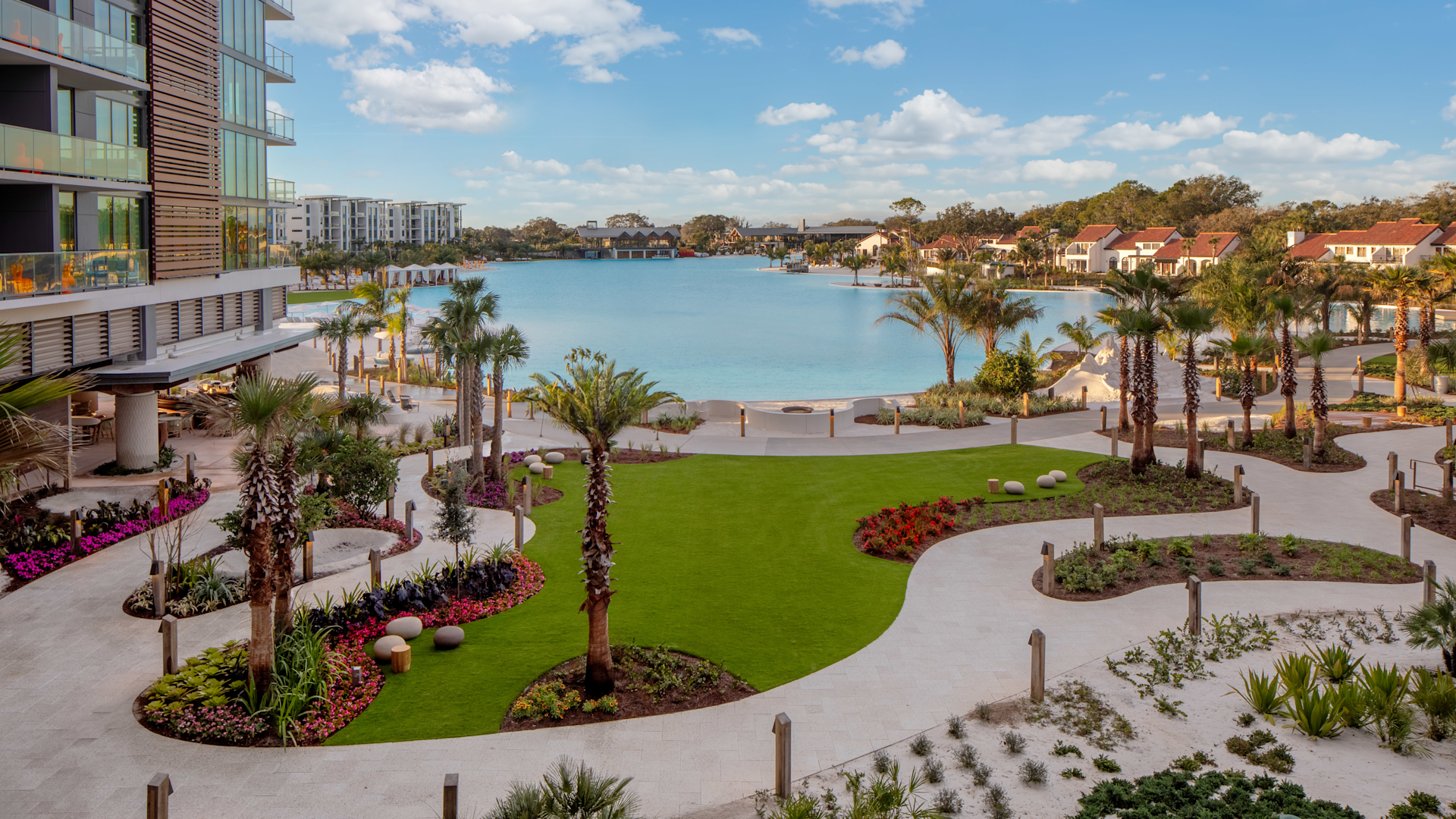 Aerial view of Conrad Orlando and Evermore Resort's lagoon at golden hour